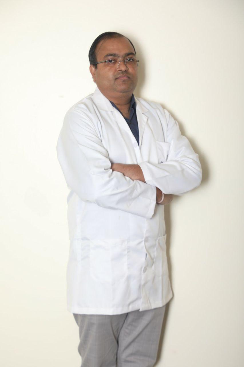 Dr Kunwar Vishal Singh, Consultant Urologist, in a white coat